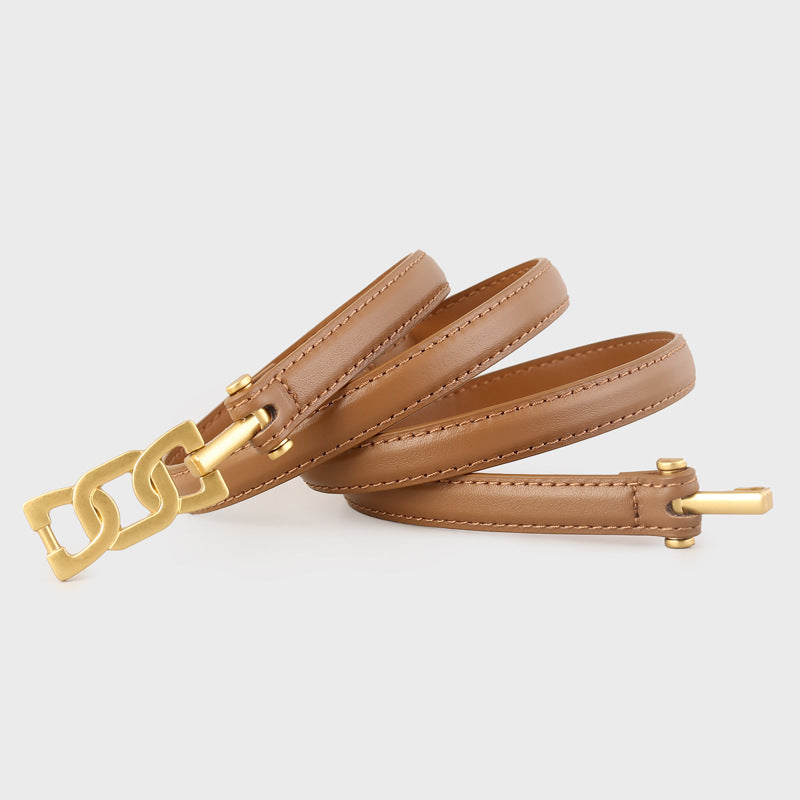Gold Buckle Skinny Leather Belt showcased in black leather with a stylish gold buckle design.