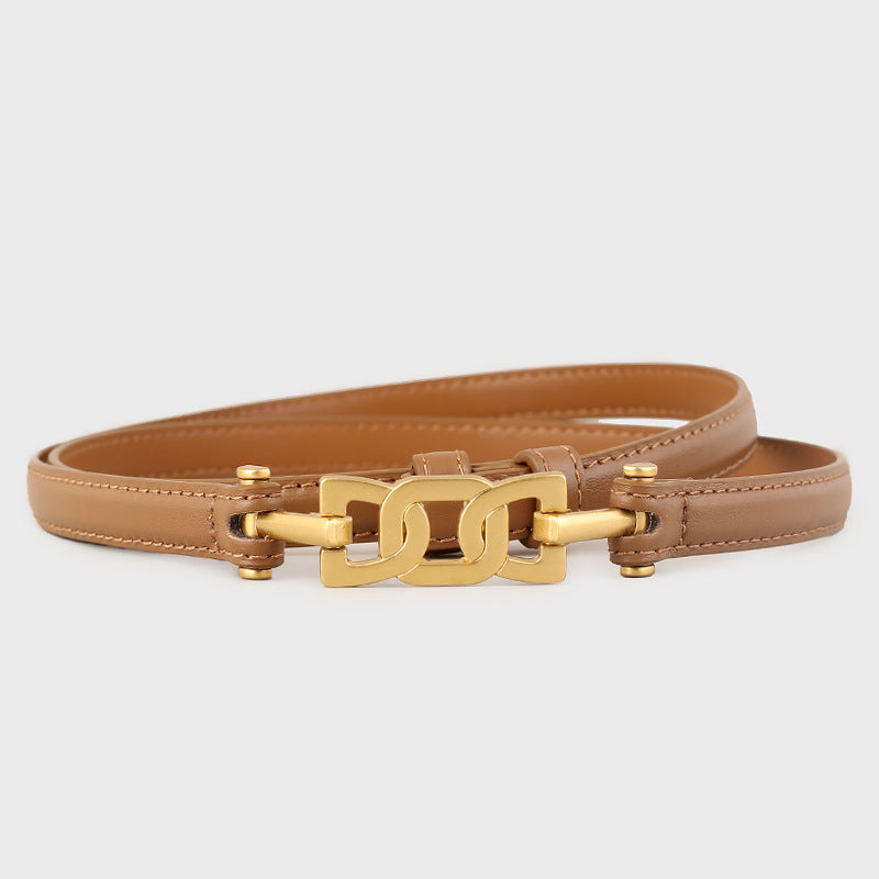 Gold Buckle Skinny Leather Belt showcased in black leather with a stylish gold buckle design.