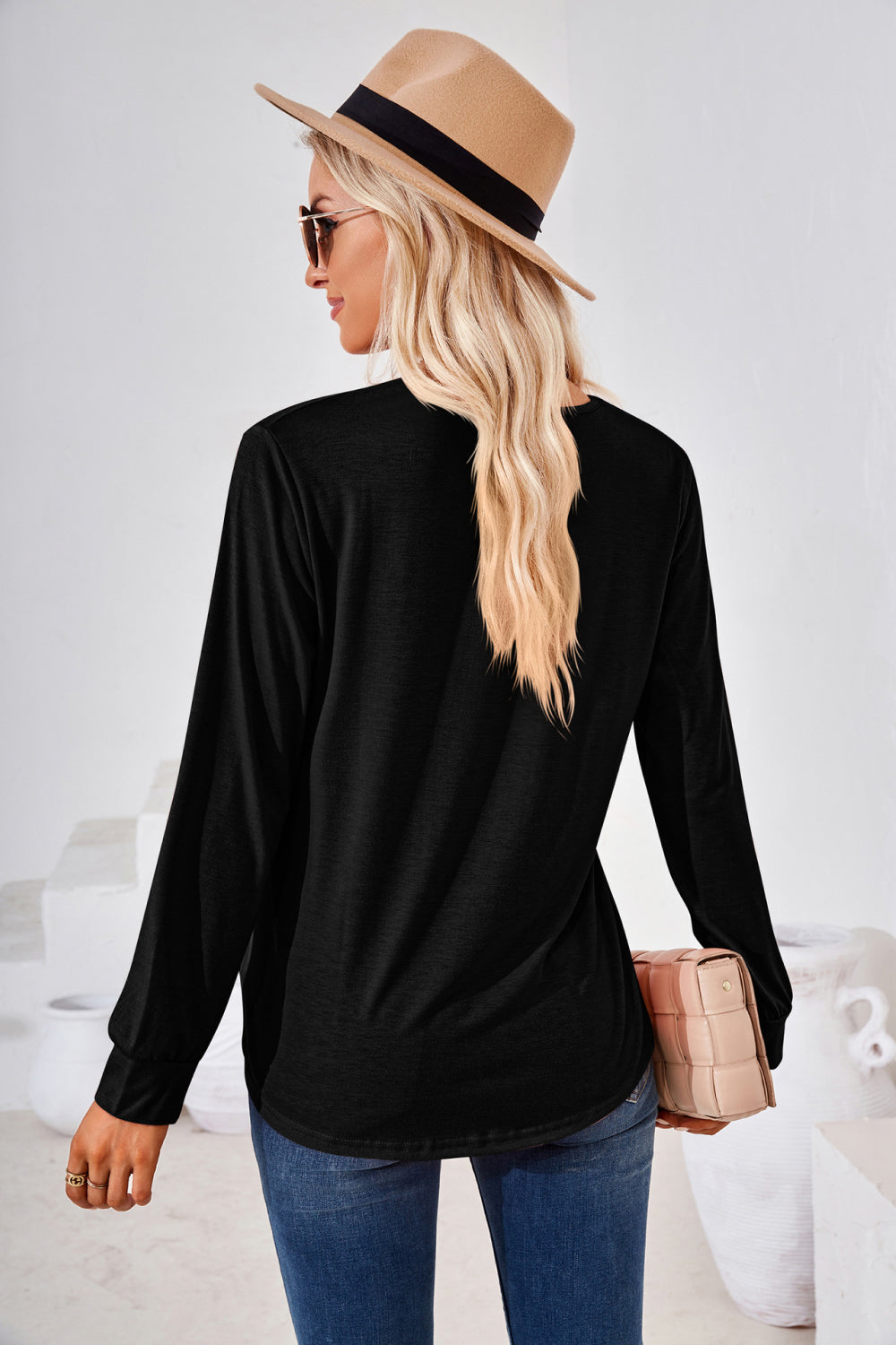 Square Neck Ruched Long Sleeve Blouse in black worn with denim, showcasing stylish back view.