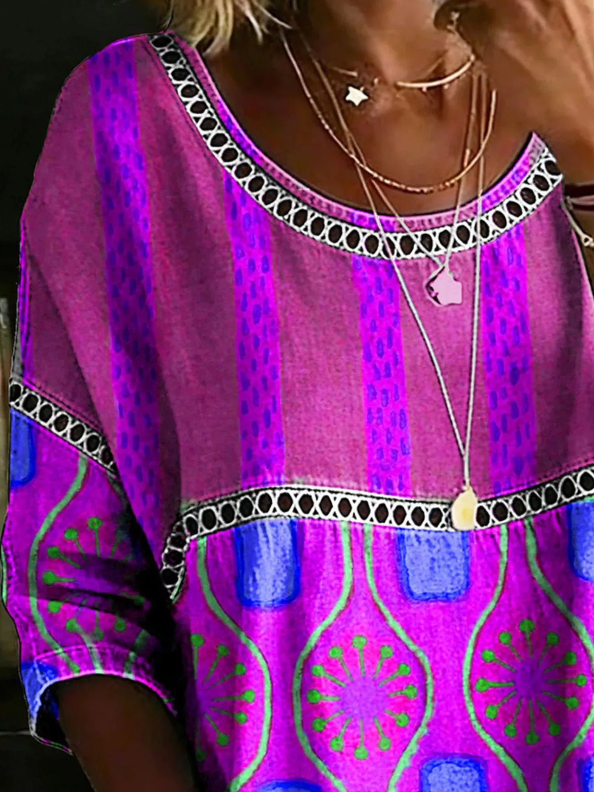 Plus Size Hollow Out Top with colorful patterns and stylish lace detail, perfect for any occasion.