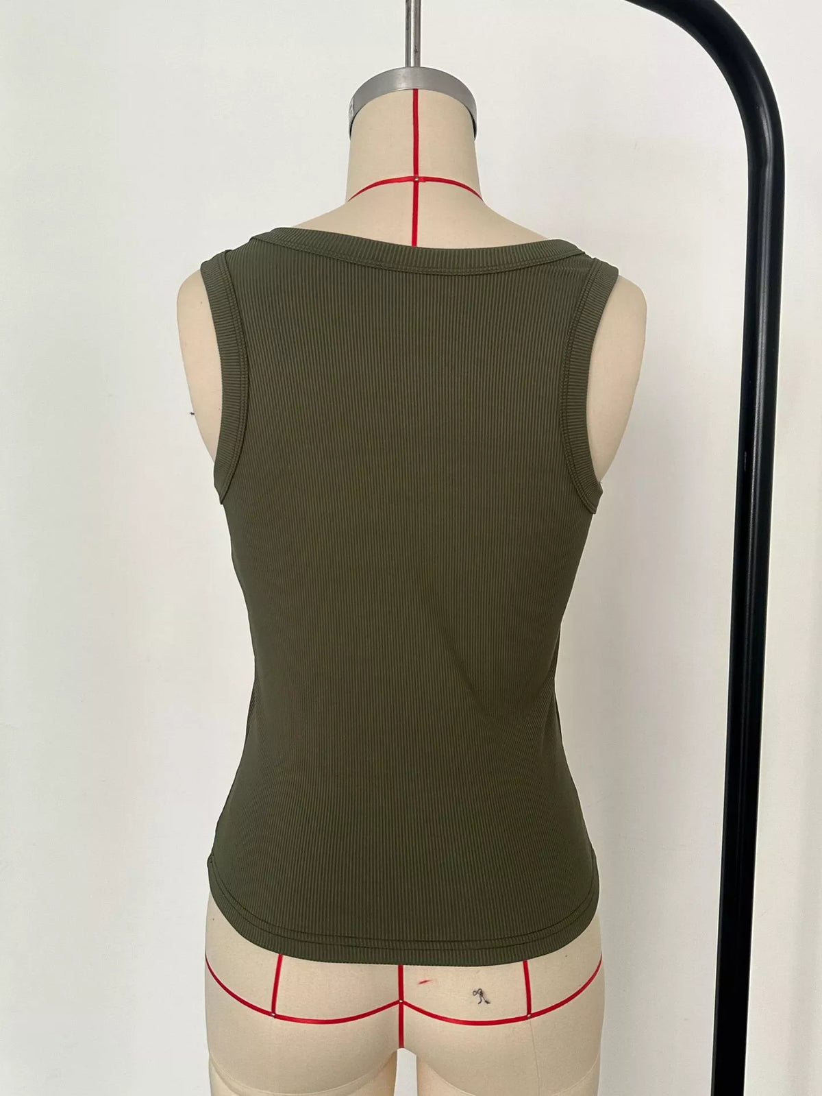 Back view of a Ribbed Knit Slim Fit Tank Top in olive green, showcasing the stylish sleeveless design.