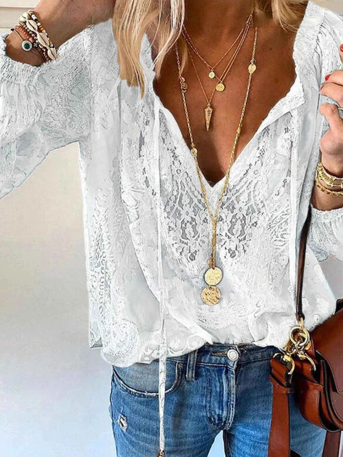 Elevate Your Style with Our Elegant Lace Tie-Neck Blouse