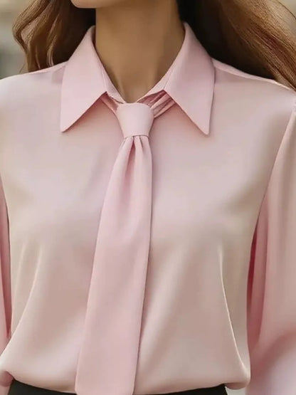 Chic Tie-Neck Blouse in beige with a stylish collar and tie detail, perfect for elegant women&