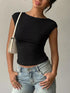 Lace Detail Cap-Sleeve T-Shirt in black worn with casual jeans and a stylish handbag.