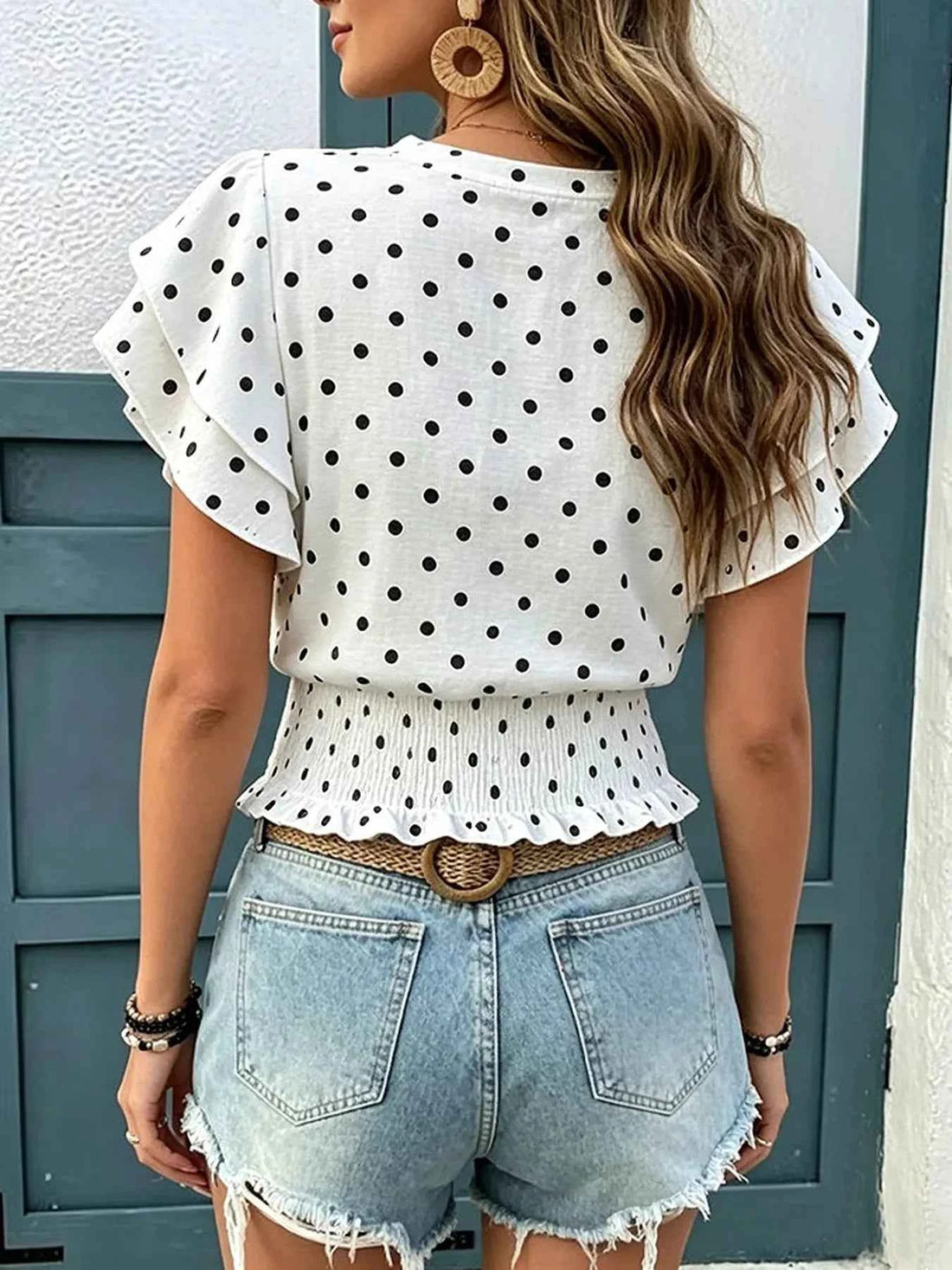 Elevate Your Wardrobe with the Polka Dot Ruffle Sleeve Blouse