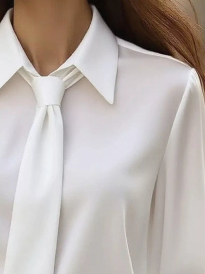 Chic Tie-Neck Blouse in beige with a stylish collar and tie detail, perfect for elegant women&