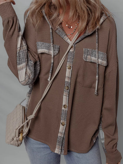 Chic Plaid Hooded Shacket featuring a buttoned front and casual style, perfect for layering.