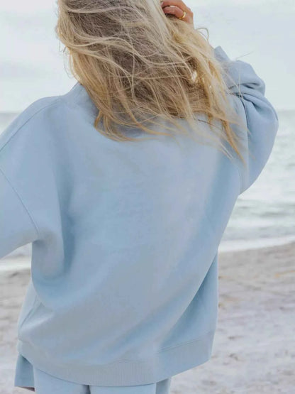 Stay Cozy and Stylish with Our Relaxed Fit Sweatshirt and Shorts Set