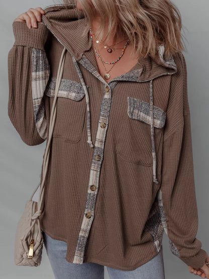 Chic Plaid Hooded Shacket featuring a buttoned front and casual style, perfect for layering.