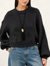 Oversized Chunky Knit Sweater worn with high-waisted jeans, showcasing cozy style and effortless fashion.