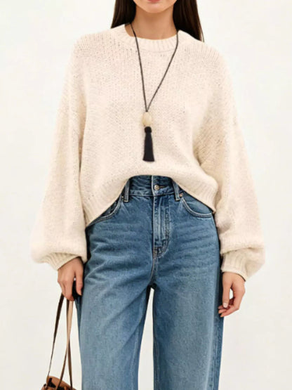 Oversized Chunky Knit Sweater worn with high-waisted jeans, showcasing cozy style and effortless fashion.