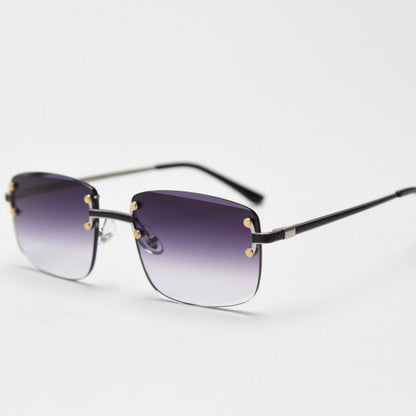 Rimless Gradient Tinted Sunglasses worn by a woman with dark hair and pearl earrings