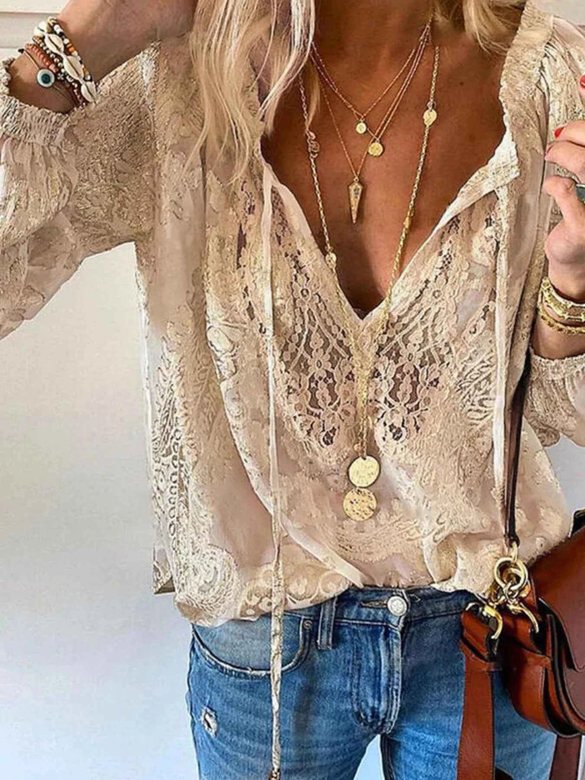 Elevate Your Style with Our Elegant Lace Tie-Neck Blouse