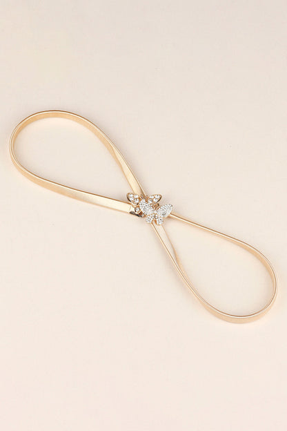 Rhinestone Butterfly Belt with golden strap and sparkling butterfly embellishments for stylish outfits.