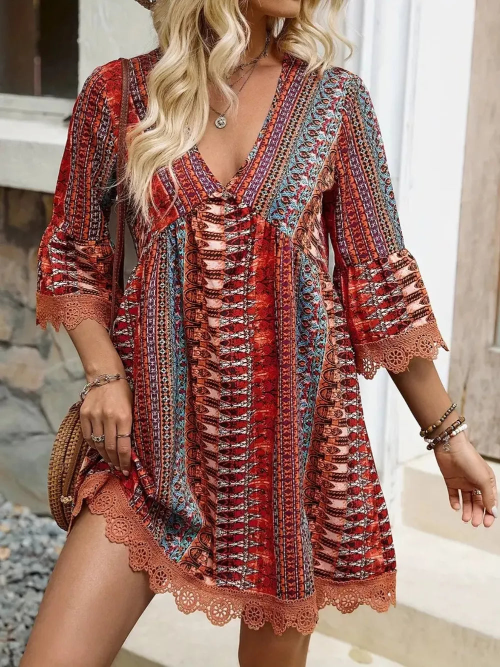 Lace Trim V-Neck Dress in vibrant patterns, showcasing elegance and comfort for casual or chic occasions.