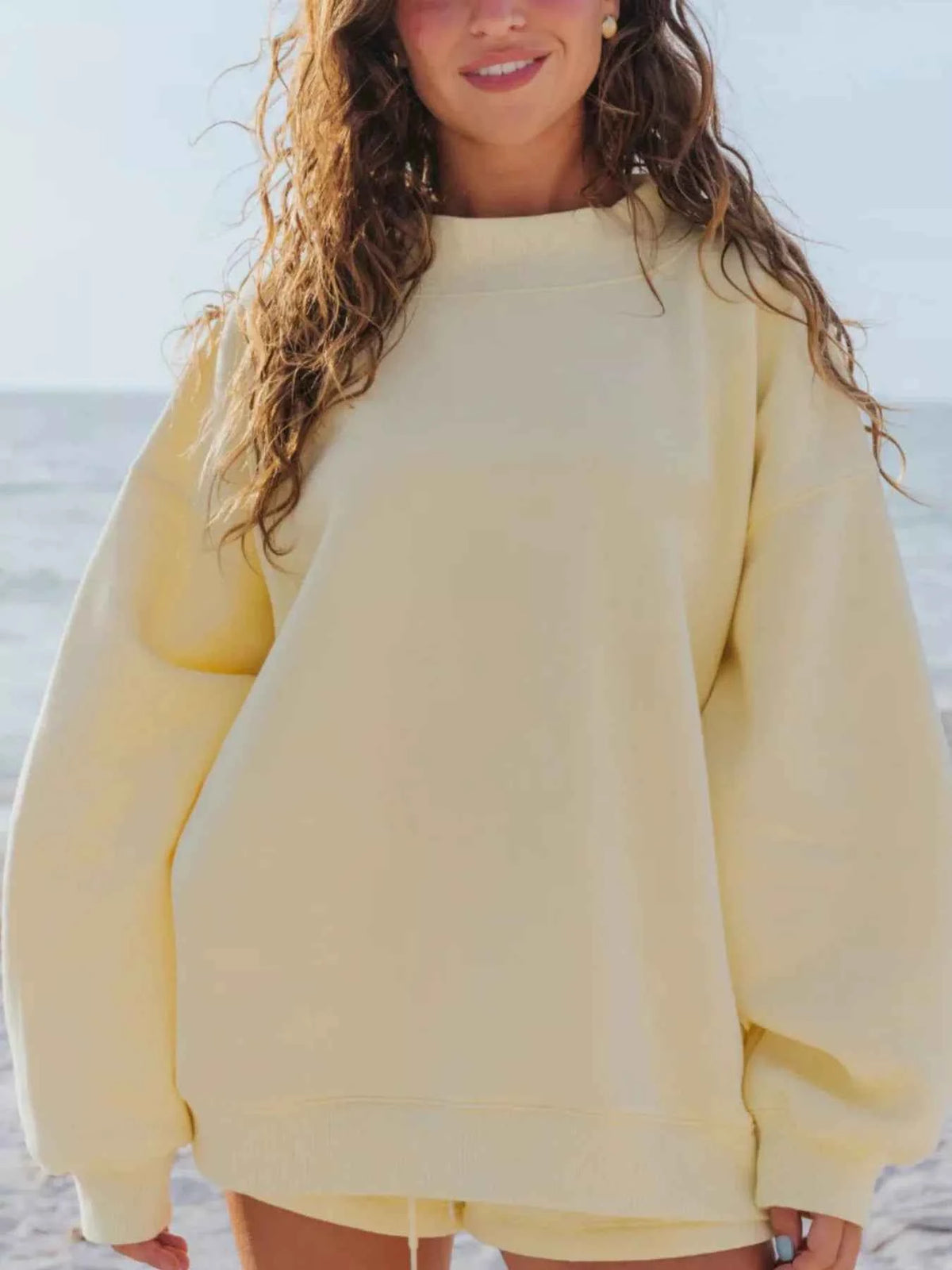 Stay Cozy and Stylish with Our Relaxed Fit Sweatshirt and Shorts Set