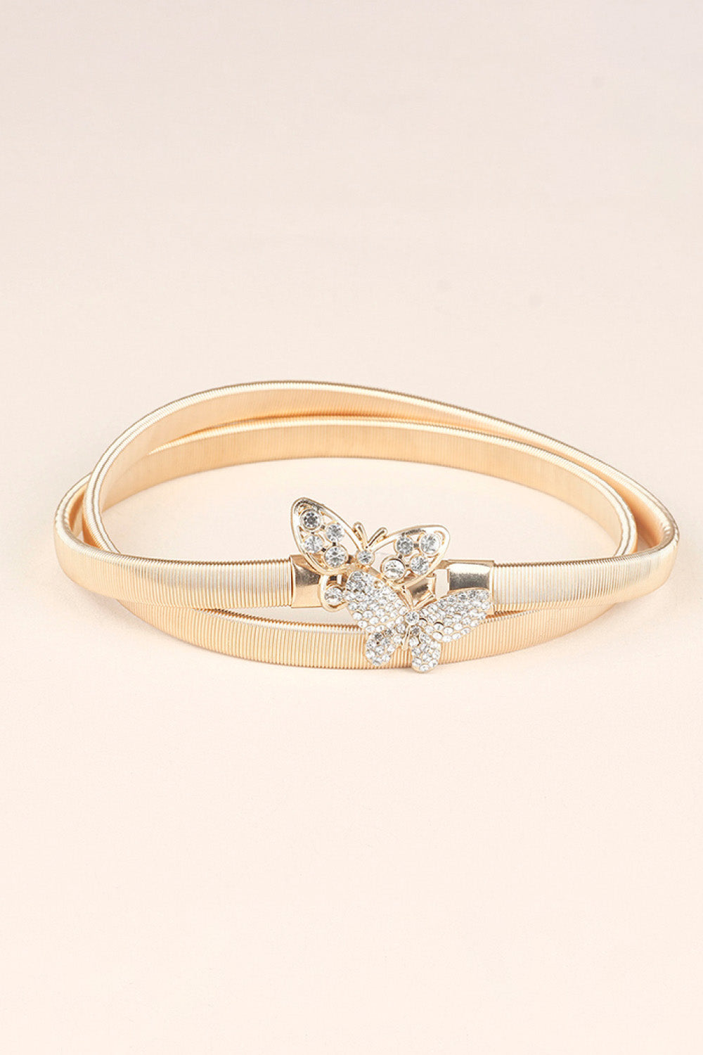Rhinestone Butterfly Belt featuring a sparkling butterfly design on a gold band, perfect fashion accessory.