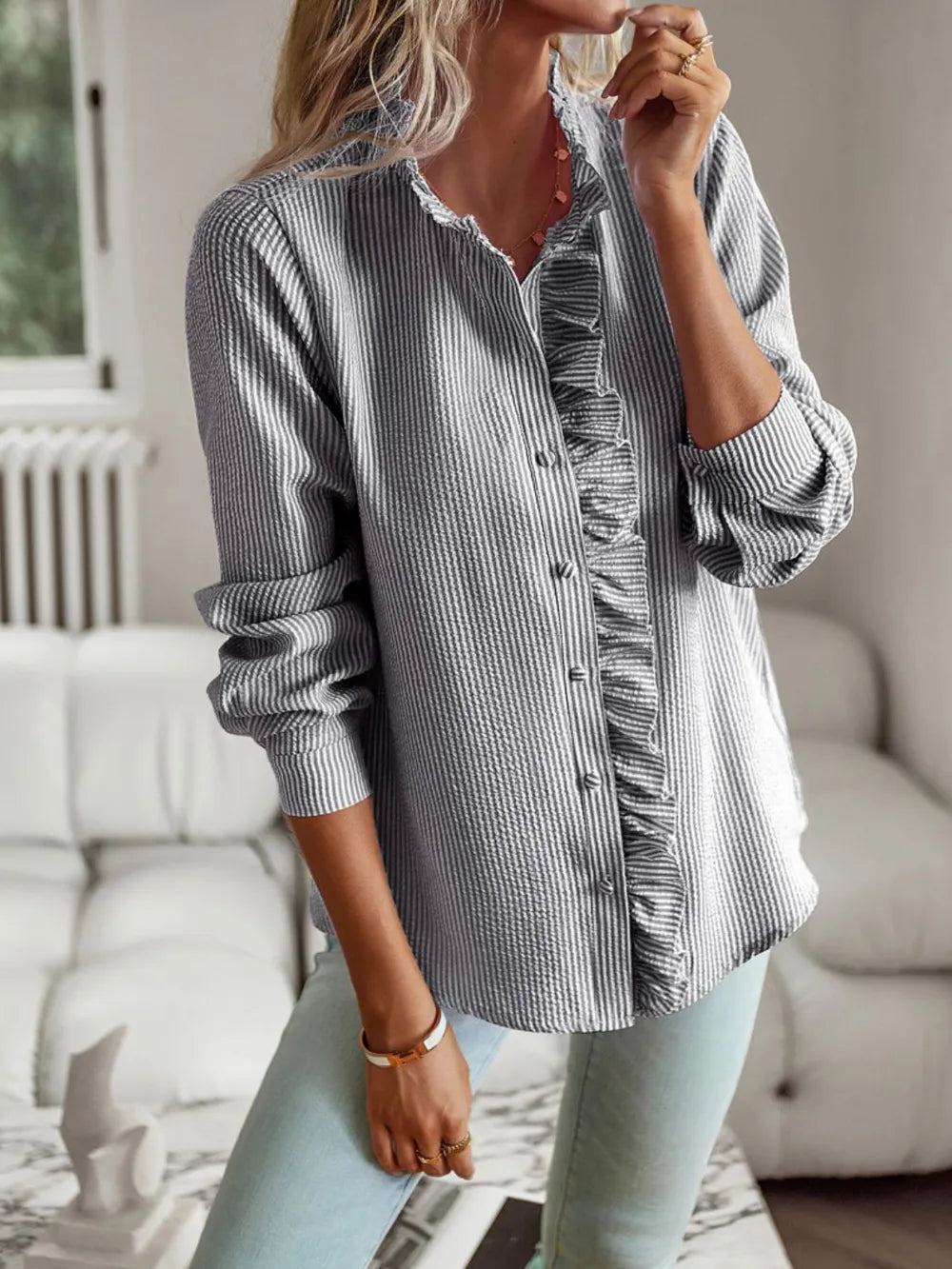 Devine Ruffle Trim Long Sleeve Shirt featuring elegant ruffle detailing and chic collared style in a casual outfit.