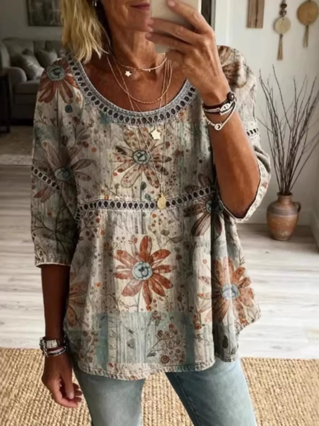 Plus Size Hollow Out Top featuring stylish floral pattern and relaxed fit, perfect for casual outings.