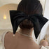 Satin Pearl Bow Hair Clip elegant hairstyle
