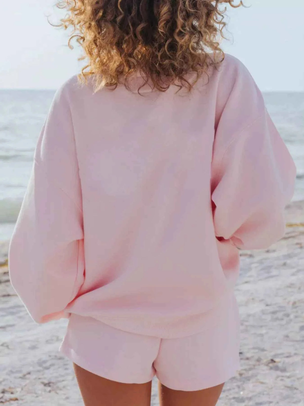 Stay Cozy and Stylish with Our Relaxed Fit Sweatshirt and Shorts Set