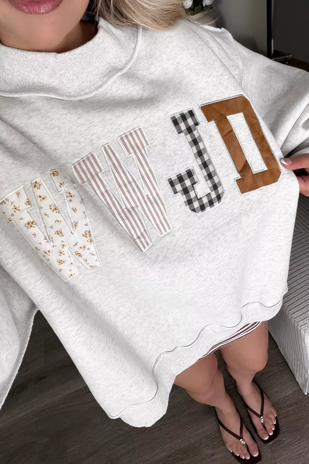 WWJD Mix Pattern Graphic Sweatshirt graphic design