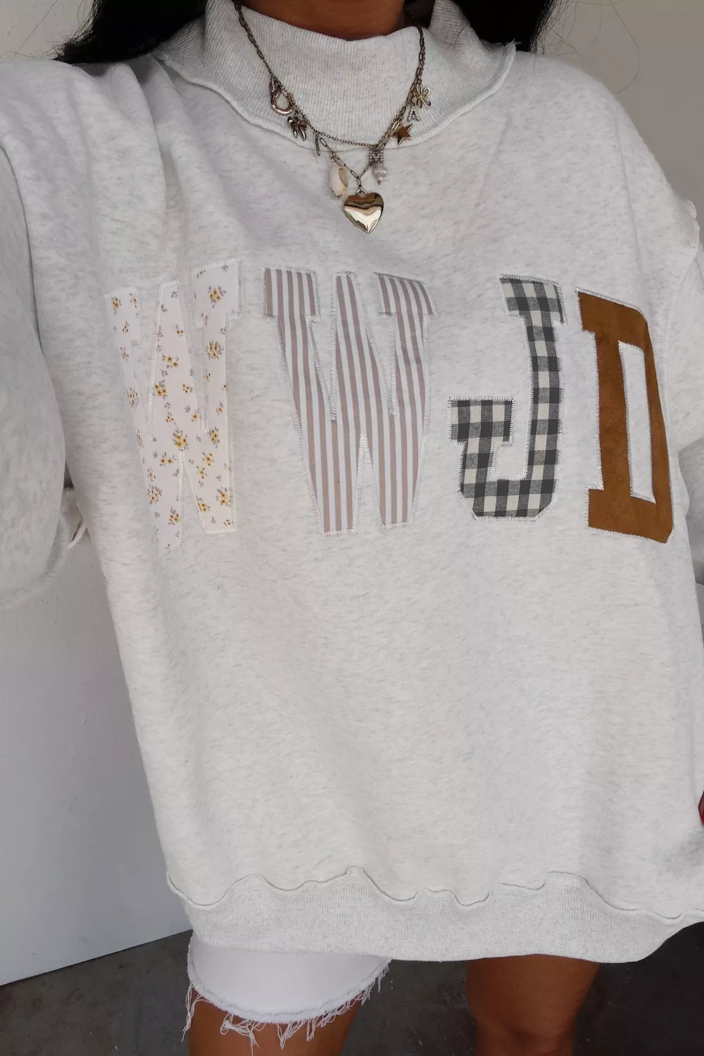 WWJD Mix Pattern Graphic Sweatshirt loose fit