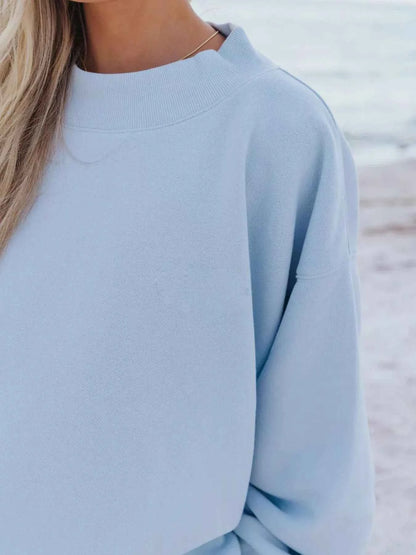 Stay Cozy and Stylish with Our Relaxed Fit Sweatshirt and Shorts Set