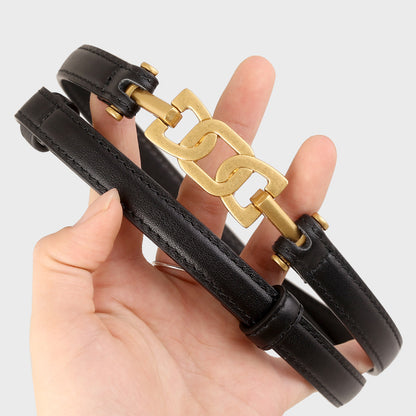 Gold Buckle Skinny Leather Belt showcased in black leather with a stylish gold buckle design.
