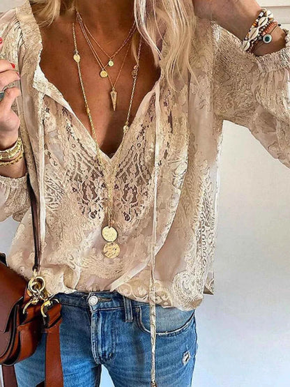 Elevate Your Style with Our Elegant Lace Tie-Neck Blouse