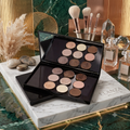 Magnetic makeup palette box organized with different shades on a marble surface, perfect for makeup lovers and artists.