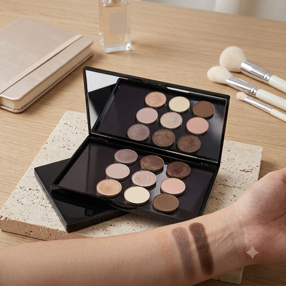 Magnetic makeup palette box with assorted eyeshadow shades on a table and swatches on a wrist.